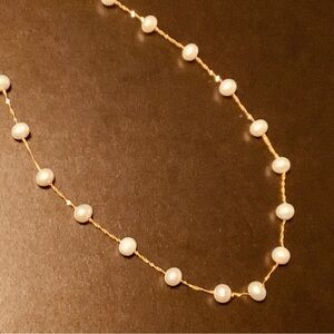 Elegant Gold and White Pearl Necklace